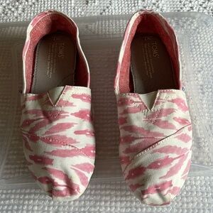 Tom’s pink and white animal print slip ons. Size 7